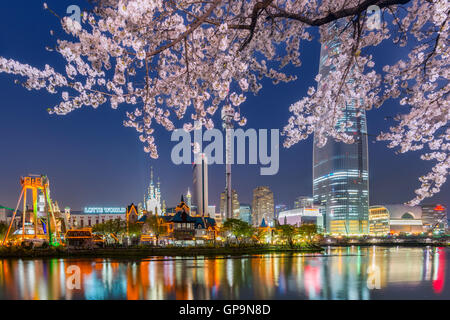 cherry blossom of Spring in Lotte World amusement park at night ,Seoul korea. Stock Photo