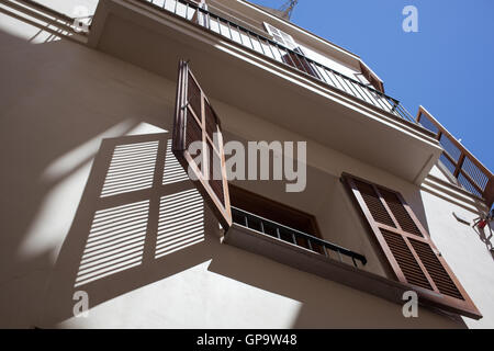 Open wooden window in hot summer day Stock Photo