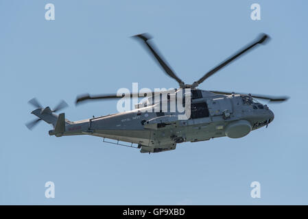 A Royal Navy Agusta Westland Merlin HM.2 helicopter carrying out a display at the Bournemouth Air Festival, UK on the 21st August 2016. Stock Photo