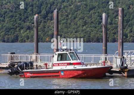 A Yonkers Fire Department rescue boat anchored on the Hudson River on the waterfront of Yonkers, New York. Stock Photo