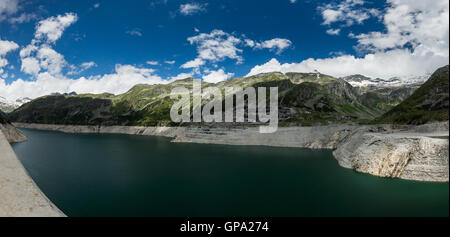 The Kölnbrein Dam is an arch dam in the Hohe Tauern range within Carinthia, Austria. Stock Photo