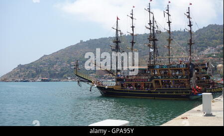 Beautiful pirates ship in Dead sea waters. Stock Photo
