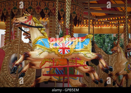 A Carousel Horse with a Union Jack flag in it Stock Photo