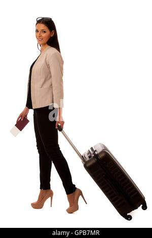 Woman with suitcase going on a business trip.