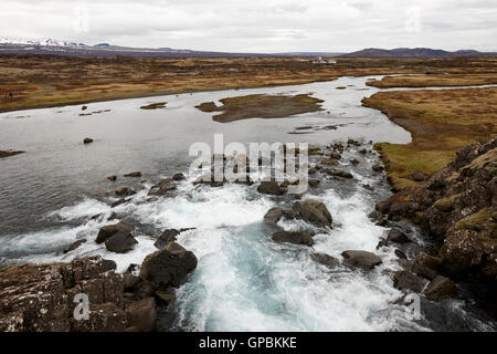 river oxara flowing into thingvellir lake in thingvellir national park Iceland Stock Photo