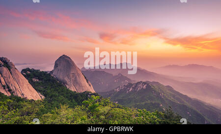 sunrise of Baegundae peak, Bukhansan mountains in Seoul, South Korea Stock Photo