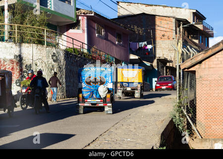 Peru - May 17 : Three wheeler taxi decorated with a Barman sticker going up a hill in Peru . May 17 2016, Peru. Stock Photo