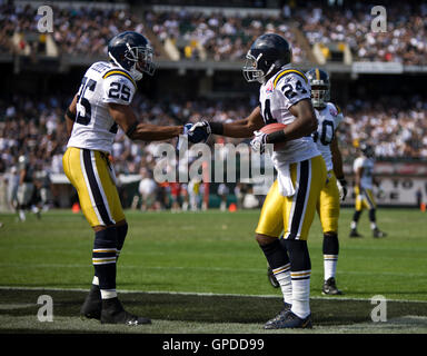 October 25, 2009; Oakland, CA, USA;  New York Jets cornerback Darrelle Revis (24) celebrates with safety Kerry Rhodes (25) after an interception during the first quarter against the Oakland Raiders at Oakland-Alameda County Coliseum. New York won 38-0. Stock Photo