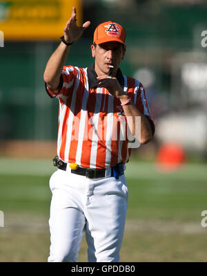 December 5, 2010; Seattle, WA, USA; NFL referee Gene Steratore (114)  signals for a first down