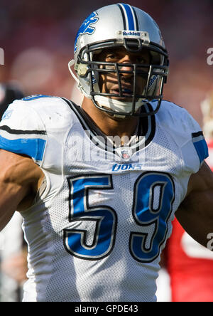 Detroit Lions linebacker Julian Peterson (98) tackles Green Bay Packers ...