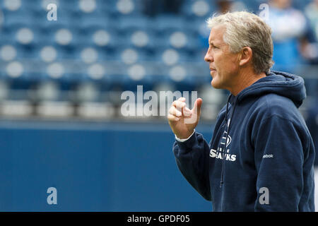 September 26, 2010; Seattle, WA, USA;  Seattle Seahawks head coach Pete Carroll watches his team warm up before the game against the San Diego Chargers at Qwest Field. Stock Photo