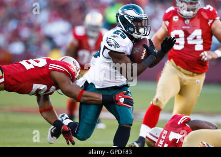 October 10, 2010; San Francisco, CA, USA;  Philadelphia Eagles running back LeSean McCoy (25) is tackled by San Francisco 49ers cornerback Nate Clements (22) during the first quarter at Candlestick Park. Stock Photo