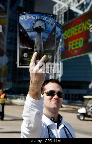 Feb 6, 2011; Arlington, TX, USA; A vendor sells programs before Super Bowl XLV between the Green Bay Packers and the Pittsburgh Steelers outside of Cowboys Stadium. Stock Photo