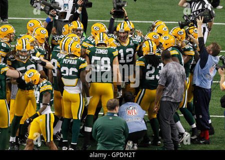 Feb 6, 2011; Arlington, TX, USA; Green Bay Packers quarterback Aaron Rodgers (12) huddles with his team before Super Bowl XLV against the Pittsburgh Steelers at Cowboys Stadium. Stock Photo