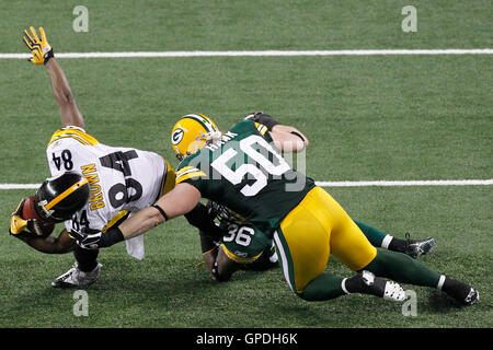 Green Bay Packers linebacker A.J. Hawk wears a Cheesehead hat during  Media Day for Super Bowl XLV in Arlington, Texas on February 1, 2011. The  Pittsburgh Steelers will take on the Green