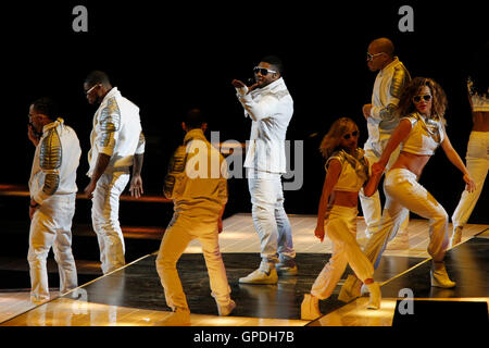 Feb 6, 2011; Arlington, TX, USA; Recording artist Usher performs during halftime of Super Bowl XLV between the Green Bay Packers and Pittsburgh Steelers at Cowboys Stadium. Stock Photo