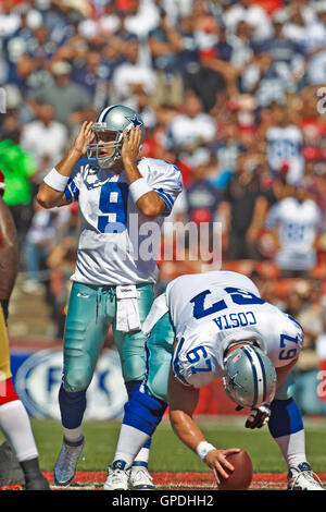 September 18, 2011; San Francisco, CA, USA; Dallas Cowboys quarterback Tony Romo (9) calls an audible behind center Phil Costa (67) against the San Francisco 49ers during the first quarter at Candlestick Park.  Dallas defeated San Francisco 27-24 in overt Stock Photo