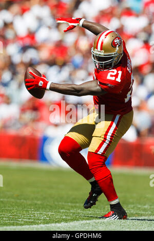 September 18, 2011; San Francisco, CA, USA; San Francisco 49ers running back Frank Gore (21) steps out of bounds after a rush against the Dallas Cowboys during the second quarter at Candlestick Park. Stock Photo