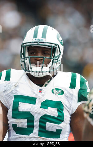 Sep 25, 2011; Oakland, CA, USA;  New York Jets inside linebacker David Harris (52) on the sidelines during the fourth quarter against the Oakland Raiders at O.co Coliseum. Oakland defeated New York 34-24. Stock Photo