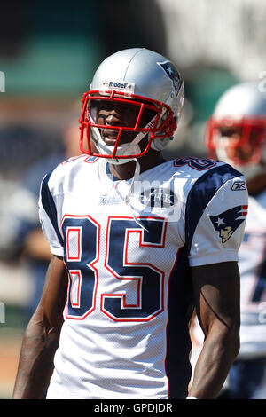 Oct 2, 2011; Oakland, CA, USA; New England Patriots wide receiver Chad Ochocinco (85) warms up before the game against the Oakland Raiders at O.co Coliseum. New England defeated Oakland 31-19. Stock Photo