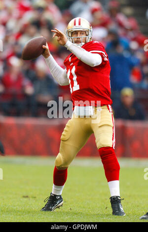 Nov 20, 2011; San Francisco, CA, USA; San Francisco 49ers quarterback Alex Smith (11) passes the ball against the Arizona Cardinals during the first quarter at Candlestick Park. Stock Photo