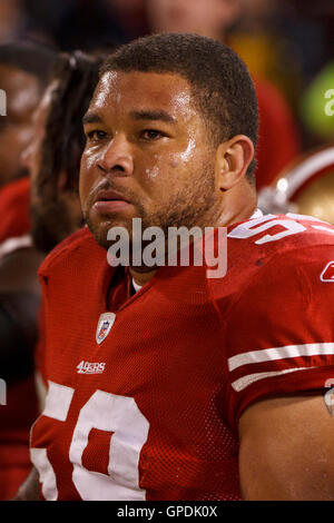 San Francisco 49ers center Jason Poe, left, and Minnesota Vikings