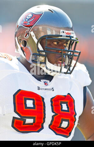 Tampa Bay Buccaneers defensive tackle Rakeem Nunez-Roches (56) with a smart  phone celebrating after an NFL football game against the Seattle Seahawks  on Nov. 13, 2022, in Munich. The Buccaneers defeated the