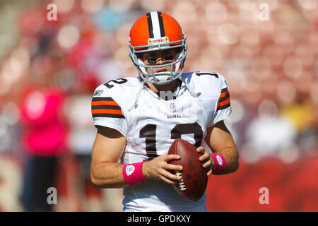 Oct 30, 2011; San Francisco, CA, USA; Cleveland Browns quarterback Colt McCoy (12) warms up before the game against the San Francisco 49ers at Candlestick Park. Stock Photo