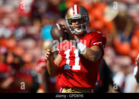 Oct 30, 2011; San Francisco, CA, USA; San Francisco 49ers quarterback Alex Smith (11) warms up before the game against the Cleveland Browns at Candlestick Park. Stock Photo