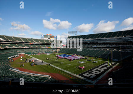 Nov 6, 2011; Oakland, CA, USA; General view of O.co Coliseum with an American flag on the field before the game between the Oakland Raiders and the Denver Broncos. Stock Photo