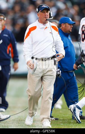 Denver Broncos Head Coach John Fox has a chat with Head Linesman