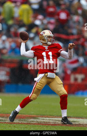 Nov 20, 2011; San Francisco, CA, USA; San Francisco 49ers quarterback Alex Smith (11) passes the ball against the Arizona Cardinals during the first quarter at Candlestick Park. Stock Photo