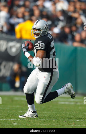 Chicago Bears running back Michael Bush (C) is hit by Houston Texans ...