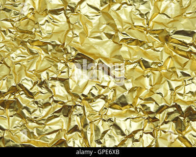 Monotone texture of the golden foil. Stock Photo