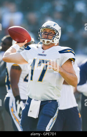 Jan 1, 2012; Oakland, CA, USA; San Diego Chargers quarterback Philip Rivers (17) warms up before the game against the Oakland Raiders at O.co Coliseum. Stock Photo