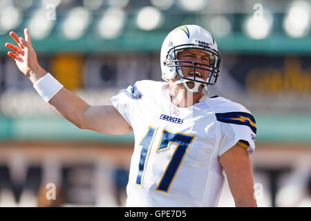 Jan 1, 2012; Oakland, CA, USA; San Diego Chargers quarterback Philip Rivers (17) warms up before the game against the Oakland Raiders at O.co Coliseum. Stock Photo