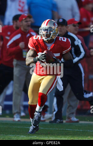 Jan 14, 2012; San Francisco, CA, USA; San Francisco 49ers cornerback Tarell Brown (25) intercepts a pass against the New Orleans Saints during the second quarter of the 2011 NFC divisional playoff game at Candlestick Park. Stock Photo