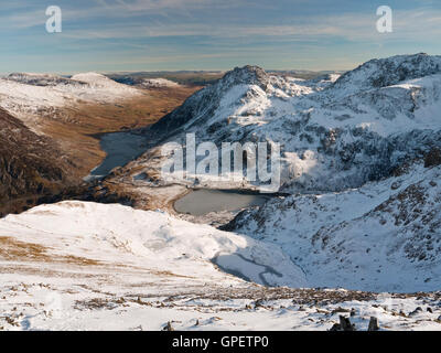 Snowdonia National Park in winter - Tryfan and the Glyders viewed from Y Garn. Llyn Idwal, Llyn Clyd & Llyn Ogwen also in view. Stock Photo