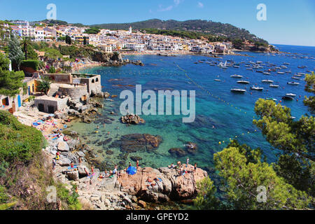 GIRONA/SPAIN - 13 AUGUST 2016: People enjoying summer on a clean transparent beach in the village of Calella de Palafrugell Stock Photo