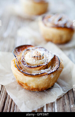 Delicious and beautiful apple rose puff pastries Stock Photo