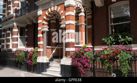 Mansion Block Red Brick Building  in VIctoria London SW1 Stock Photo