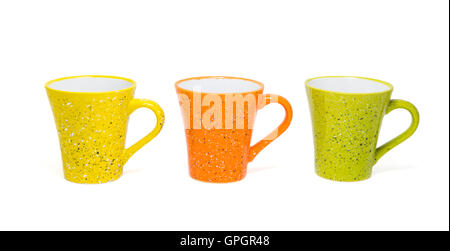 three colorful coffee cups isolated on white background. Stock Photo