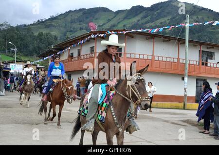 Horse race - Fiestas de la Virgen del Carmen and Fiestas Patrias ( Independence Day ) in Sapalache ' Las Huaringas '  - PERU Stock Photo