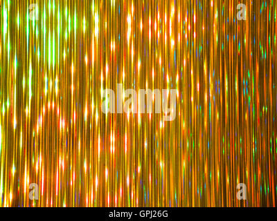 Golden striped luminous colorful metallic background Stock Photo