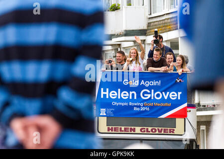 Penzance, Cornwall, UK. 04th Sep, 2016. Crowds line the streets of her hometown to congratulate Olympic rower HELEN GLOVER on her second gold medal. Fiance STEVE BACKSHALL sits with her in rthe front and takes a selfie. Credit:  Mike Newman/Alamy Live News Stock Photo