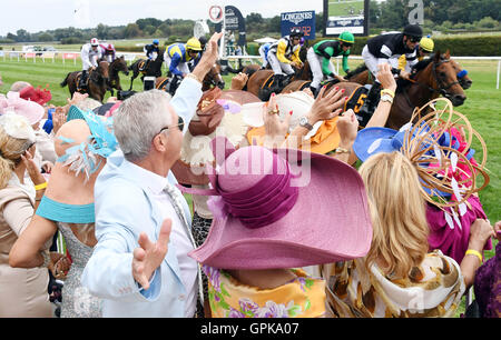 Iffezheim, Germany. 4th Sep, 2016. Unusual hat fashion can be seen at the 'Grosse Woche' equestrian event at the gallop race track in Iffezheim, Germany, 4 September 2016. PHOTO: ULI DECK/dpa/Alamy Live News Stock Photo