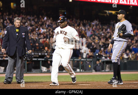 April 12, 2010; San Francisco, CA, USA;  San Francisco Giants third baseman Pablo Sandoval (48) scores a run on a wild pitch by Pittsburgh Pirates relief pitcher D.J. Carrasco (77) during the sixth inning at AT&T Park. San Francisco defeated Pittsburgh 9- Stock Photo