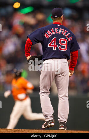 June 25, 2010; San Francisco, CA, USA;  Boston Red Sox starting pitcher Tim Wakefield (49) watches San Francisco Giants shortstop Juan Uribe (5) round the bases on a one run home run during the third inning at AT&T Park. Stock Photo