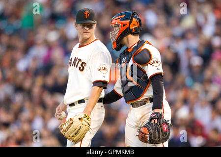 July 27, 2010; San Francisco, CA, USA;  San Francisco Giants first baseman Buster Posey (right) talks to San Francisco Giants starting pitcher Matt Cain (18) during the fourth inning against the Florida Marlins at AT&T Park. Stock Photo