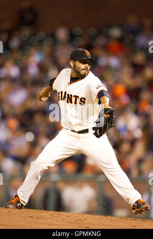 July 27, 2010; San Francisco, CA, USA;  San Francisco Giants relief pitcher Sergio Romo (54) pitches against the Florida Marlins during the eighth inning at AT&T Park. Stock Photo